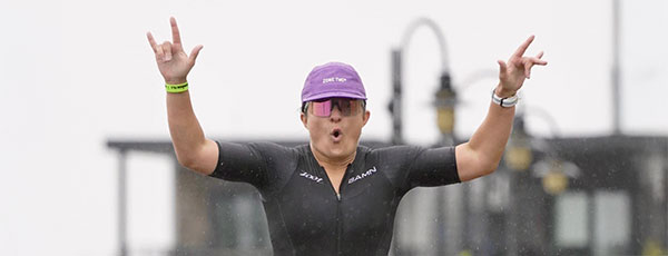 Run2 Triathlon Coaching Services. Runner in the rain.